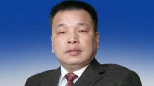 China Holds Top Journalist, Family Under Criminal Detention
