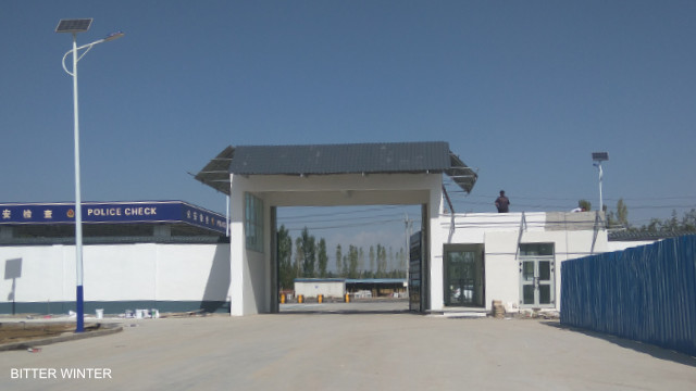 Welcome to “freedom”: entering the area of the Yining camp where inmates should work in nine factories.