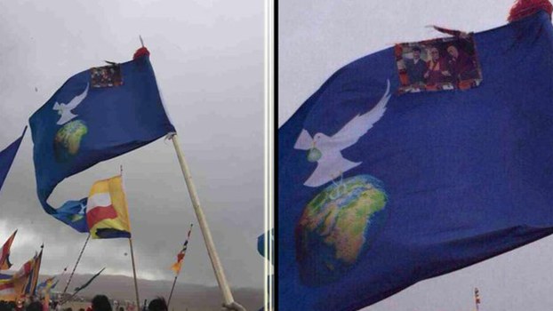 The flag with a color photo of the Dalai Lama and other Tibetan figures that landed shopkeeper Sonam Dhargyal in jail at a religious festival in February 2015. He was released April 4, 2020 after serving his full five-year term.