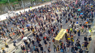 Large Numbers of Hong Kong Residents Leave Amid National Security Crackdown