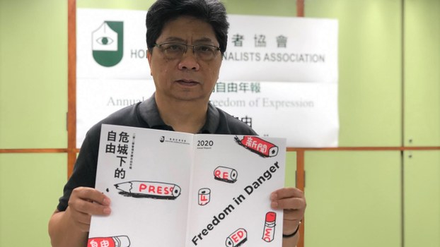 Hong Kong Journalists Association chairman Yang Jianxing warns of disappearing press freedoms in Hong Kong
